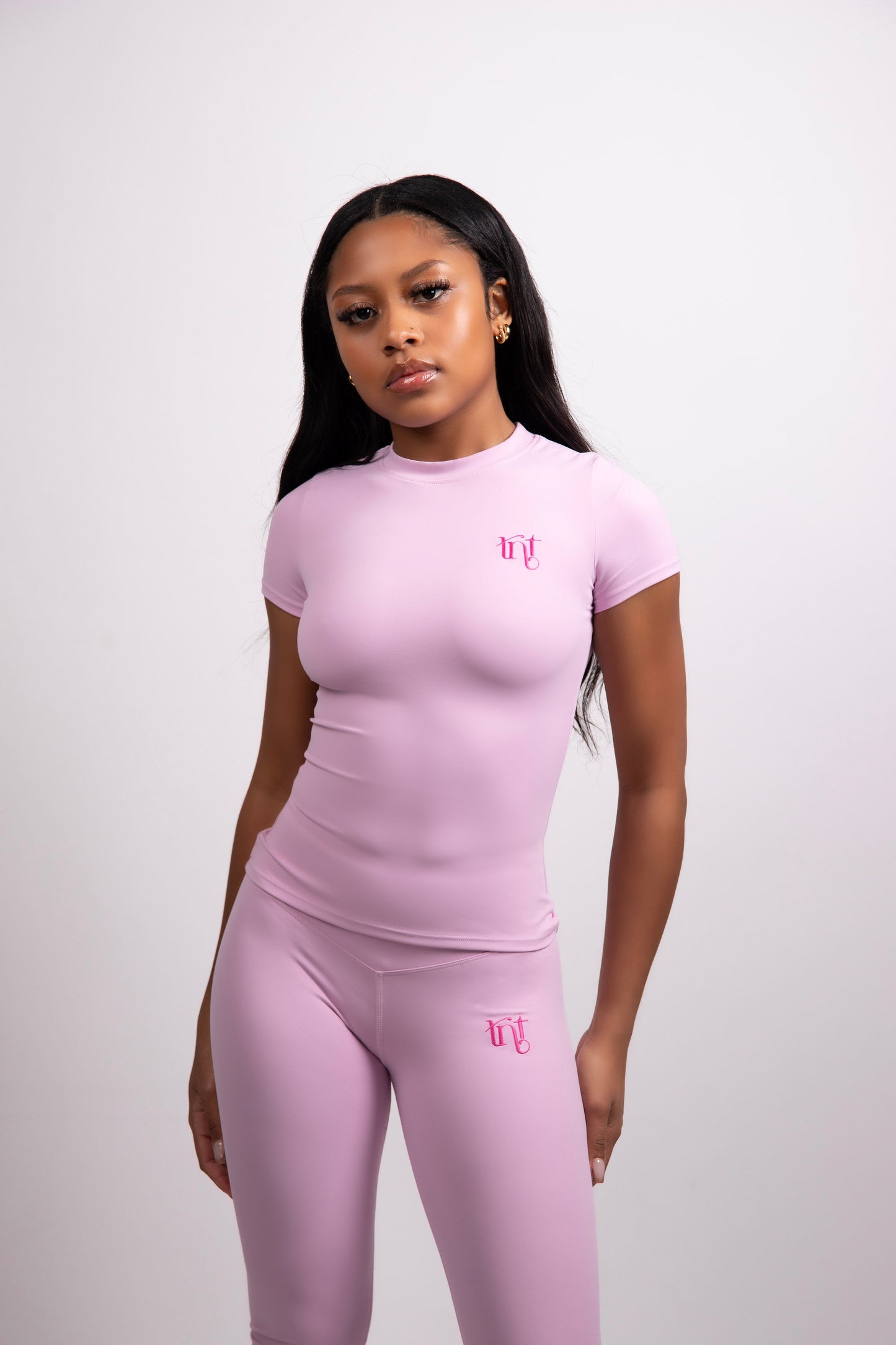 Camiseta de compresión de manga corta en color rosa bebé y magenta